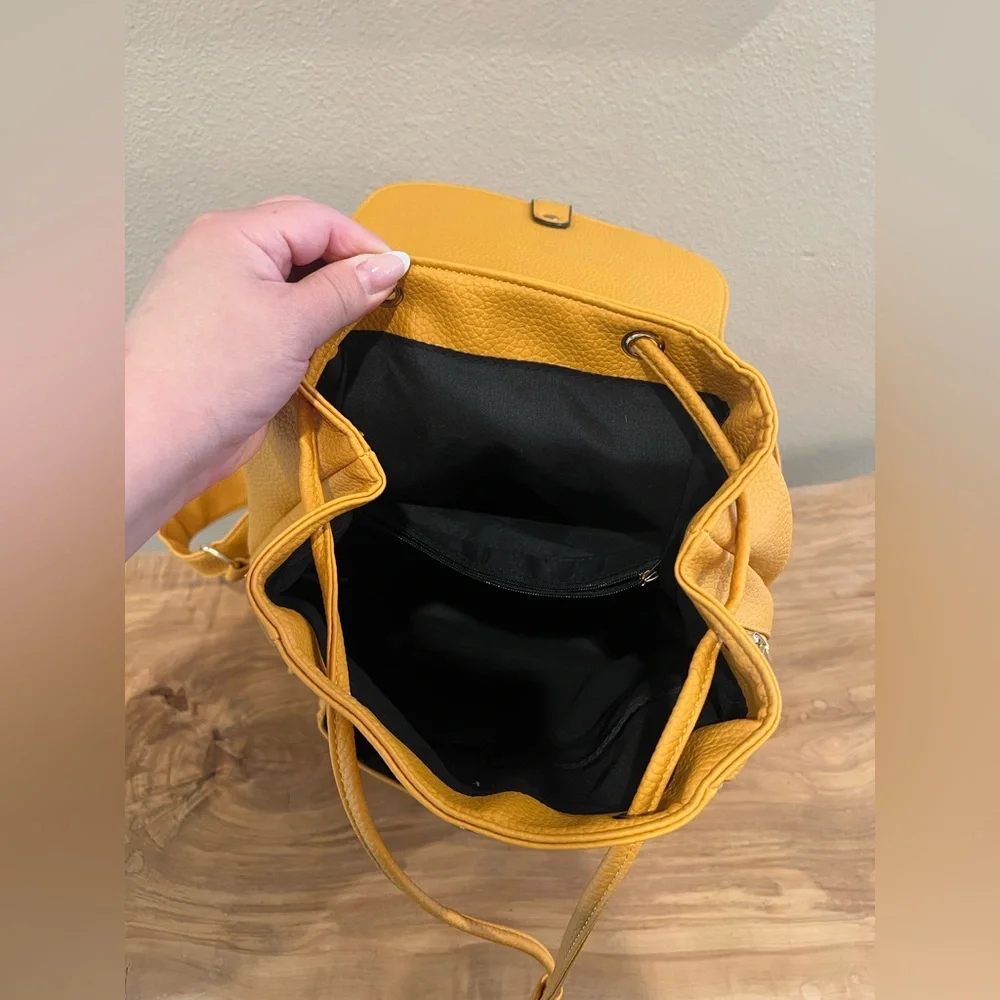 Yellow Textured Pleather Backpack with Silver Clasp
